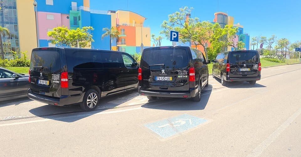 Fat Cats Transfers fleet parked on the Marina de Albufeira